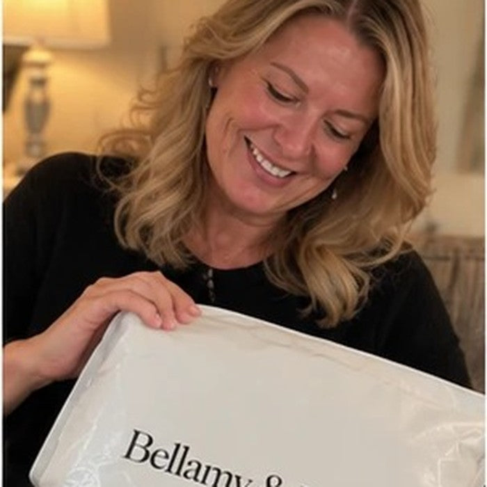 Customer holding her Bellamy & Laurent package